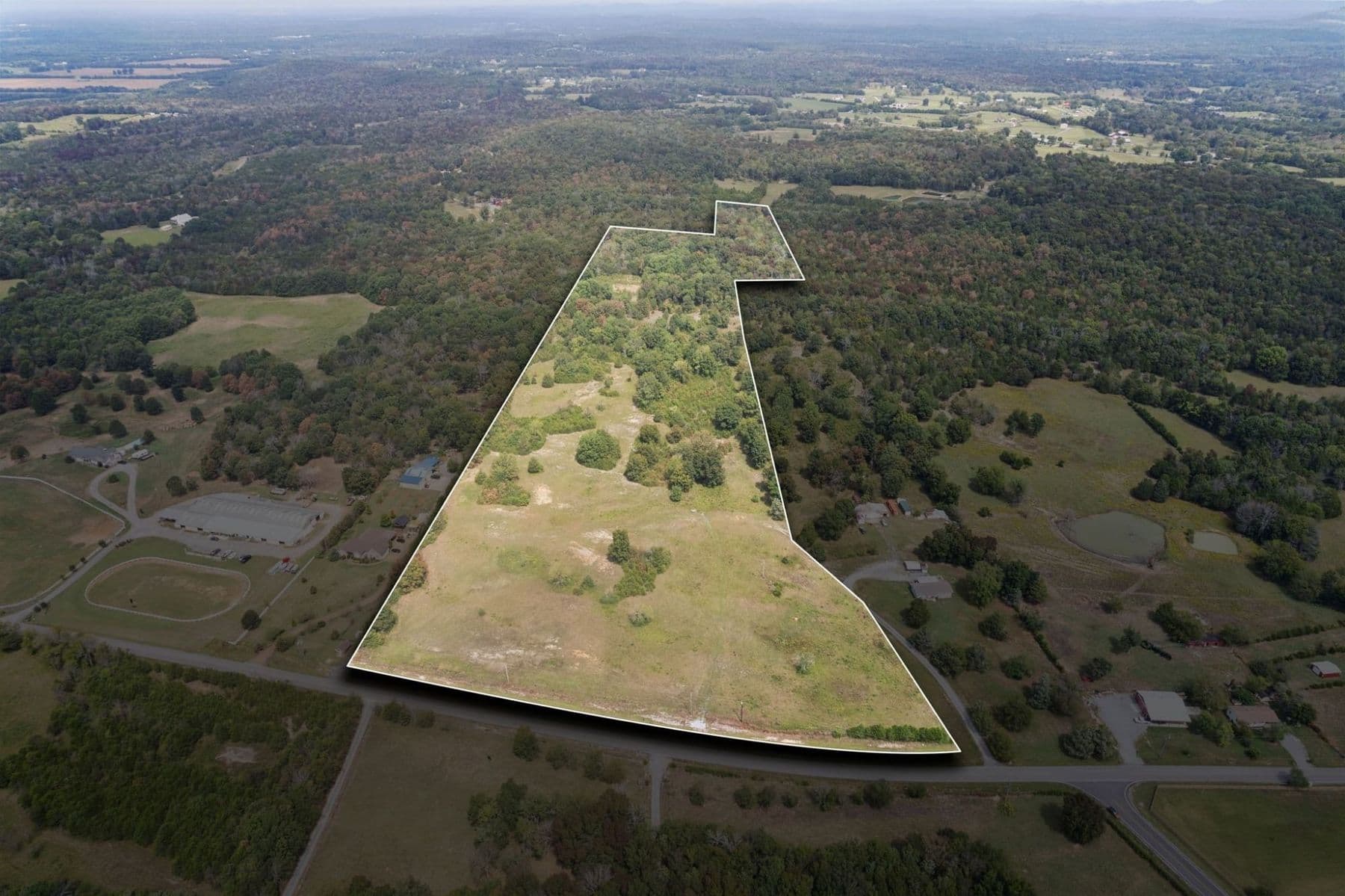 Sold: acreage tract outlined in an aerial view of Middle Tennessee countryside