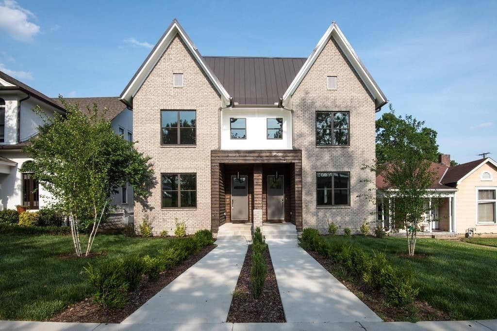 Sold: new construction home with twin gables and metal roof
